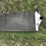 Б/у радиатор интеркулера 8200008761 Renault Espace 4,  Laguna 2,  Vel Satis