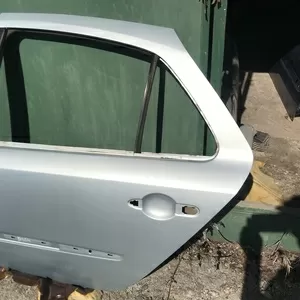Б/у дверь задняя левая Renault Laguna 2,  7751472439,  лифтбэк,  цвет TEB64, 